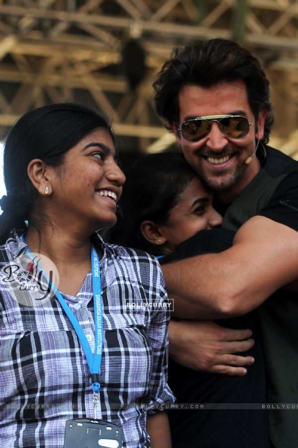 Hrihik Roshan being hugged by a fan at the launch of Krrish 3 game (298813)