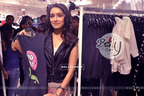 Shraddha Kapoor checks out the collection at Forever 21's store launch