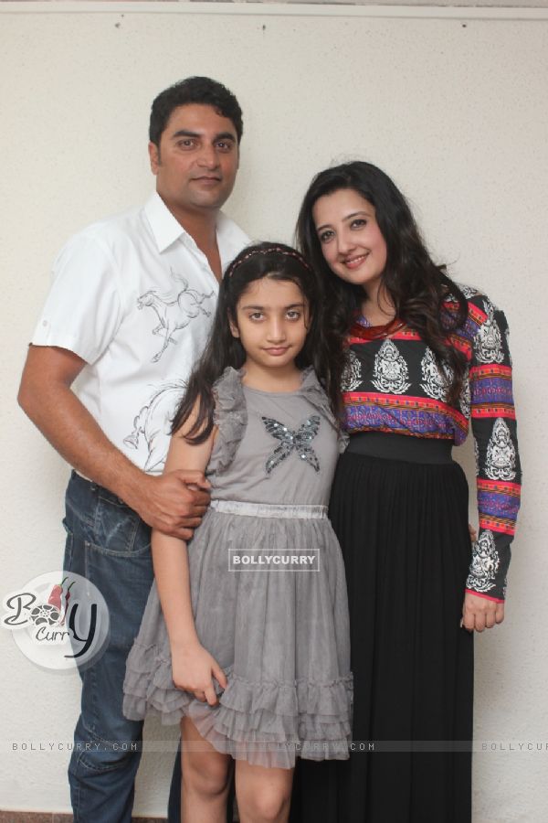 Amy Billimoria with her husband and daughter at the party