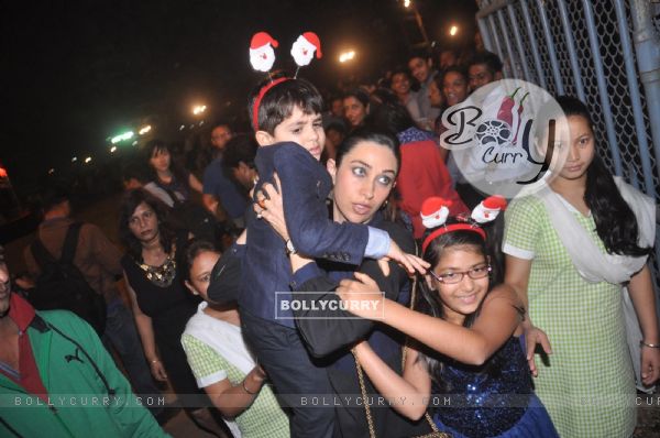 Karisma Kapur with her children at the midnight mass for Christmas
