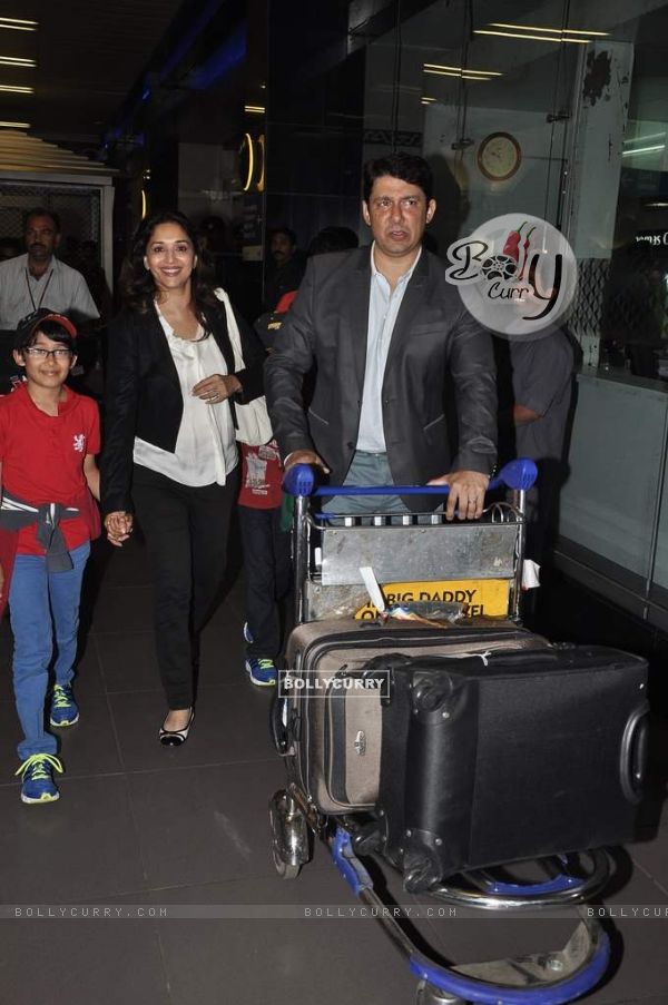 Madhuri Dixit with her family clicked at the airport on 2nd Jan. 2014
