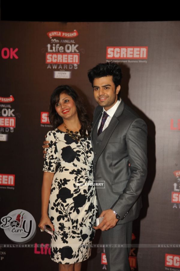 Manish Paul with his wife at the 20th Annual Life OK Screen Awards