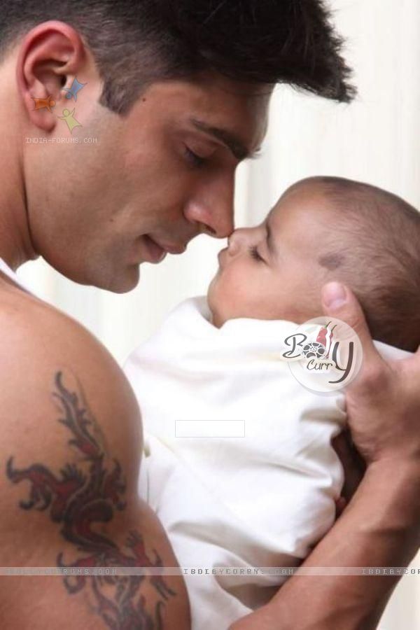 Karan Singh Grover with the baby