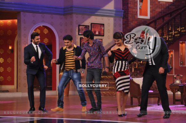 The cast of Gunday and Kapil Sharma perform with an audience member (311338)
