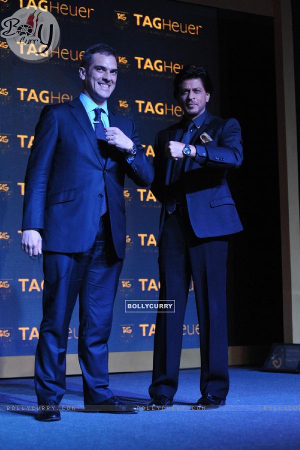 Shahrukh Khan shows off his watch at The Golden Era of the Carrera event by TAG Heuer