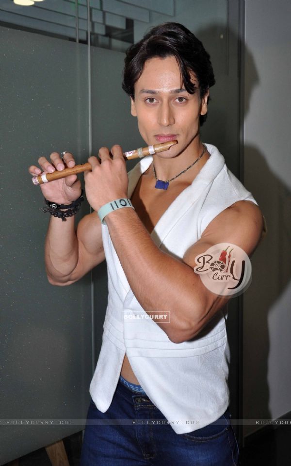 Tiger Shroff poses with a flute at 'Whistle Bajja' song launch