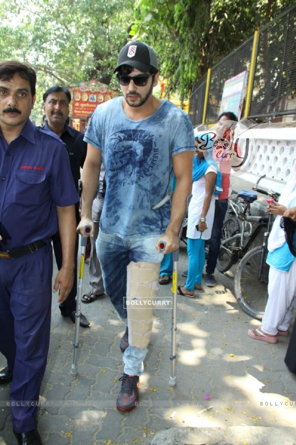 Zayed Khan arrives with a broken leg to cast his vote at a polling station in Mumbai