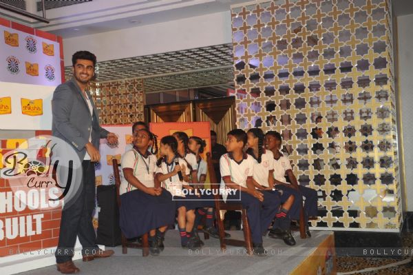 Arjun Kapoor joins the children at a P&G Shiksha event