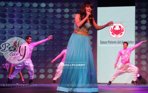 Neeti Mohan performs at the 'Caring with Style' fashion show at NSCI