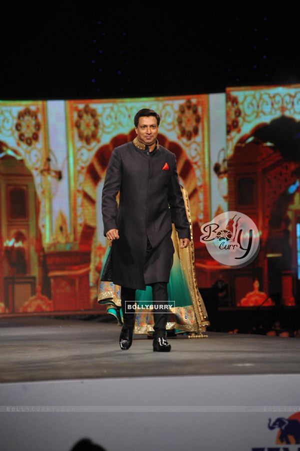 Madhur Bhandarkar walked the ramp at the 'Caring with Style' fashion show at NSCI
