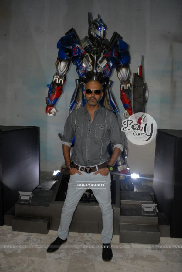 Raghu Ram was at the Unveiling of Transformers 4 lead robot Optimus Prime