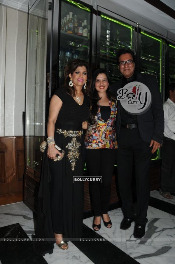 Talat Aziz posing with Amy Billimoria and Bina Aziz and at the Music Mania Event