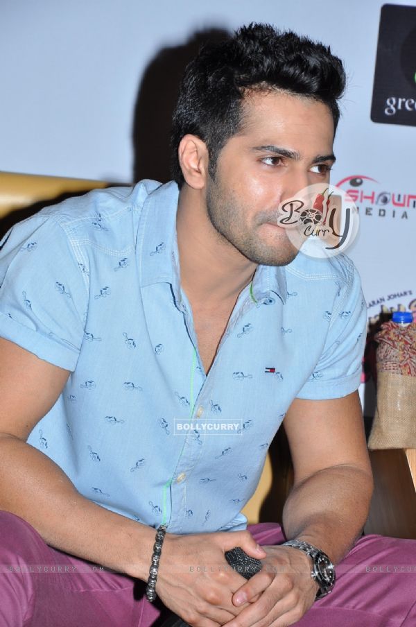 Varun engrossed in questions at the Press Meet