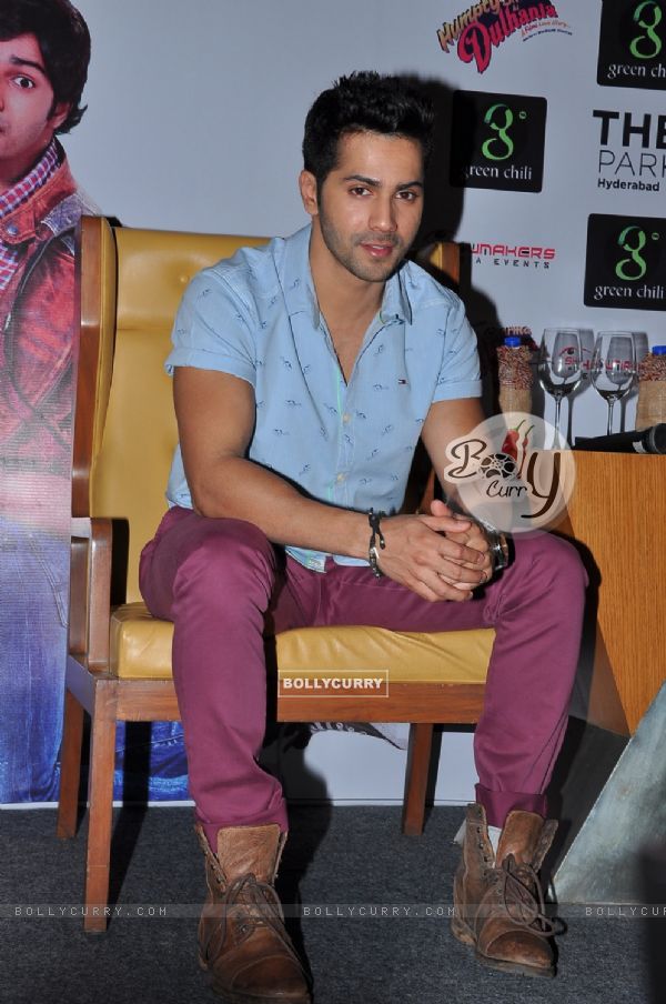 Varun Dhawan poses smartly for the Press