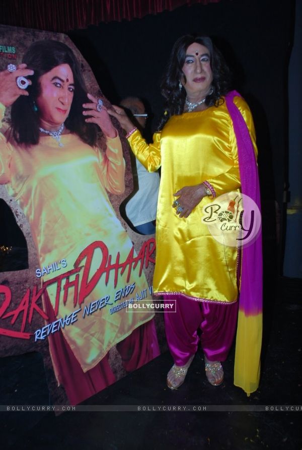 Shakti Kapoor poses with the poster of Rakth Daar