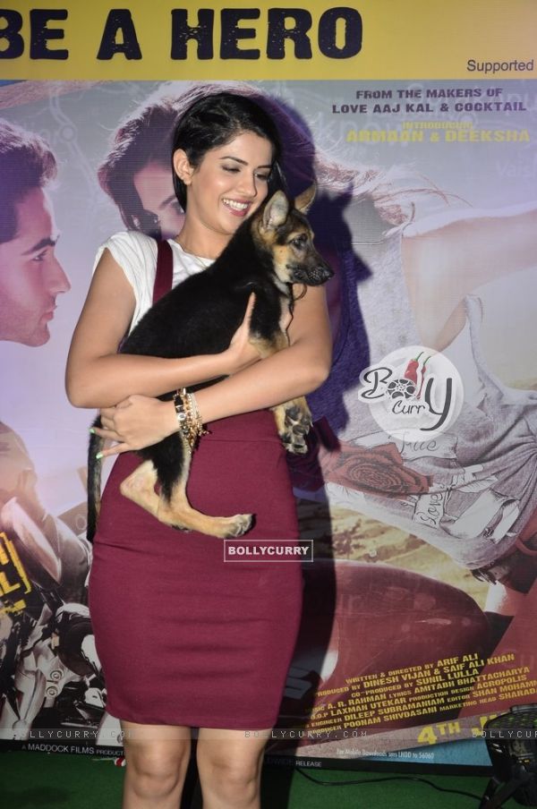Deeksha Seth holds a puppy (323874)