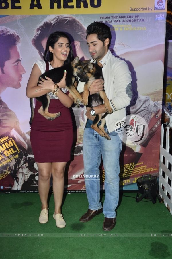 Armaan and Deeksha pose with puppies