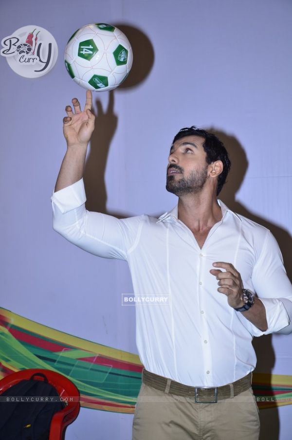 John Abraham poses with football at Castrol Photo Shoot