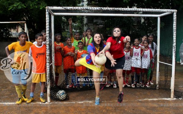 Rakhi Sawant leaps to save a goal