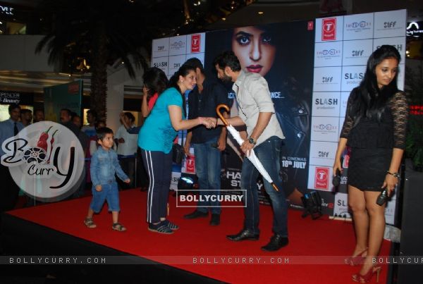 Jay speaks to a fan during the Promotions of Hate Story 2