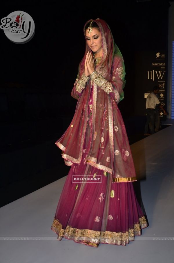 Neha Dhupia joins her hands in namaste at the IIJW 2014 - Day 1