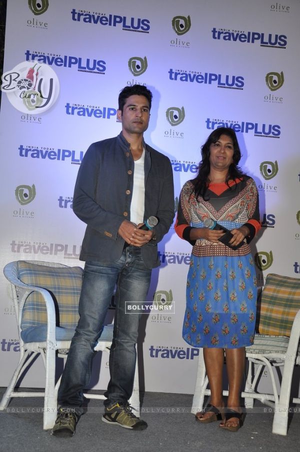 Rajeev Khandelwal poses with the host at the Promotion of his Travel Magazine