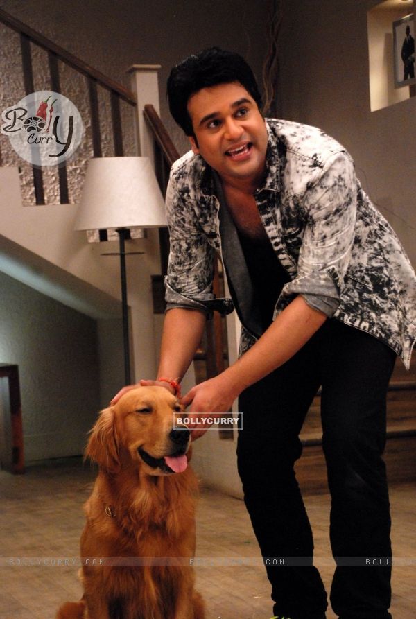 Krushna Abhishek pose with the Dog at the Promotion of It's Entertainment