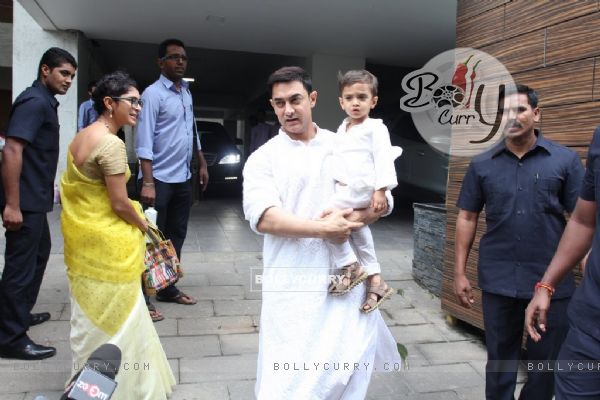 Aamir Khan spotted holding his son Azad outside his home