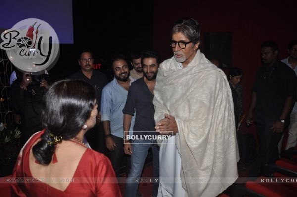 Amitabh Bachchan speaks to a guest at the launch of Shekhar Ravjiani's Hanuman Chalisa Album