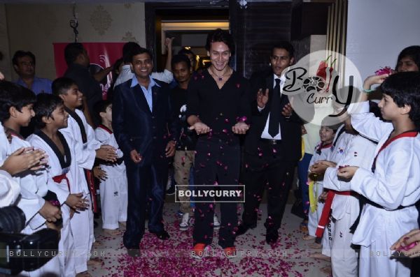 Tiger Shroff was given a floral welcome by the students