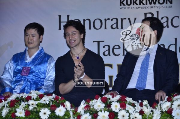 Tiger Shroff gives a smiling pose for the camera