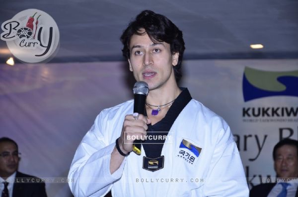 Tiger Shroff addressing the audience at the Kukkiwon Award Ceremony