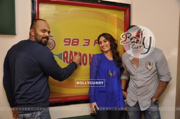 Ajay, Kareena and Rohit pose for the media at Radio Mirchi Studio