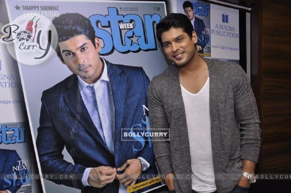 Siddharth Shukla poses with the Starweek Magazine Poster at the Launch
