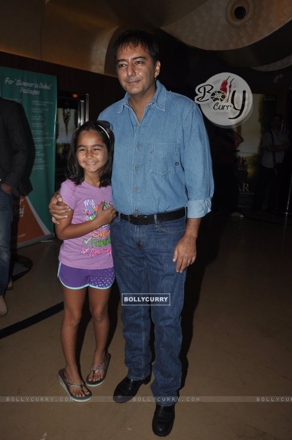 Kamal Saldanah with a child at Roar Film Launch (330012)