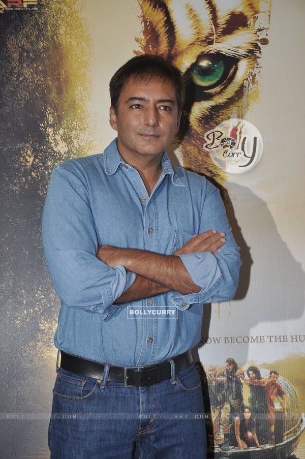 Kamal Saldanah poses for the media at Roar Film Launch