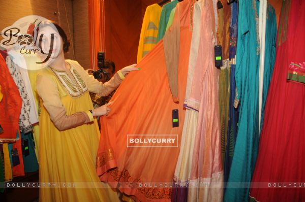 Sasha Agha checksout the collection at the Inaugration of Fashion Apparel Label Zinnia