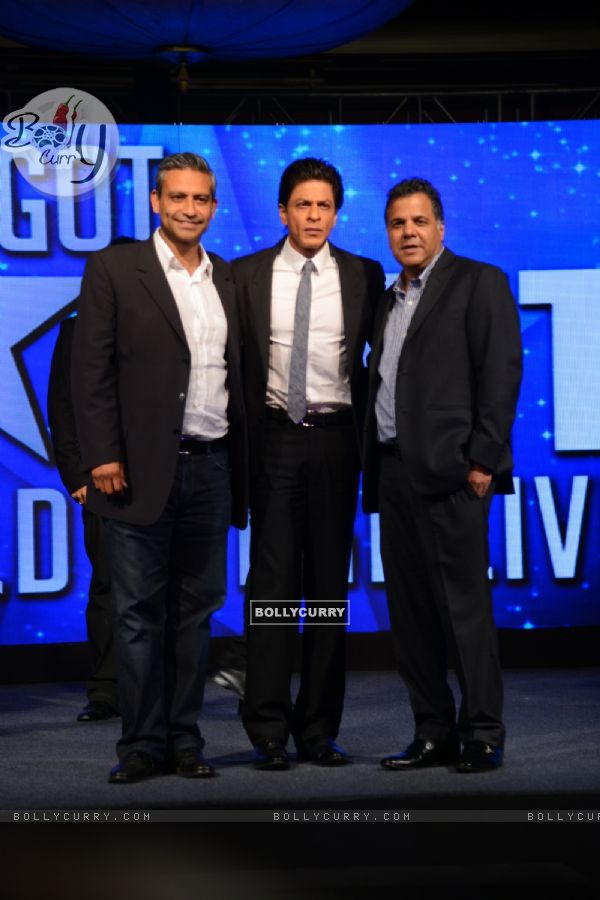 Rav Singh, Shah Rukh Khan and Raj Nayak pose for the media