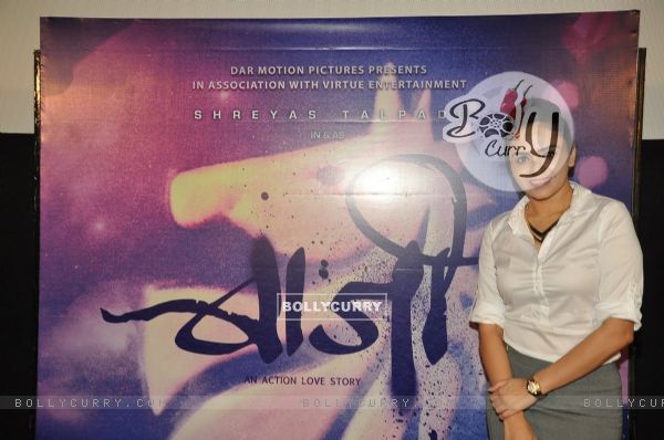 Amruta Khanvilkar poses with the poster of Baji at the First Look Launch (330269)