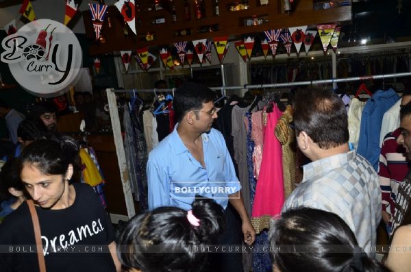Akshay Kumar checks out the clothes at the Special Sale of Garments of the movie Entertainment