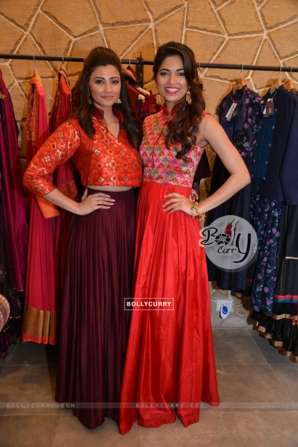 Parvathy Omanakuttan and Daisy Shah pose for the media at Hue Store