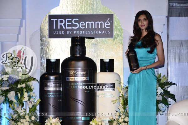 Diana Penty poses with the Tresseme product at the launch