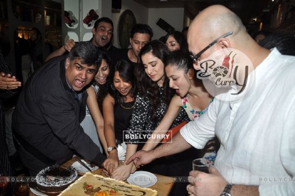 The Cast cutting the cake at 100 Episodes Completion Party