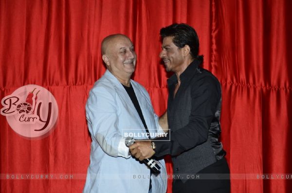 Anupam Kher hugging Shah Rukh Khan at the Trailer Launch of Ekkees Topon Ki Salaami