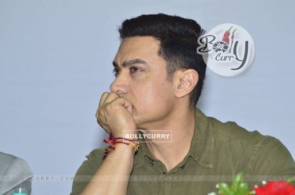 Aamir Khan gives an attentive ear at the Communicative Marathi Book Launch