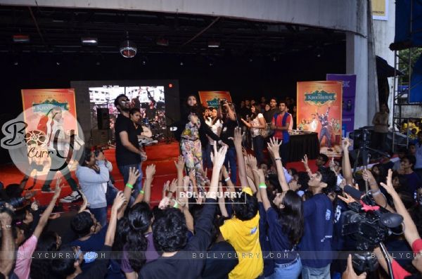 Sonam Kapoor throws some goodies to her fans at the Promotions of Khoobsurat at Mithibai College (332869)