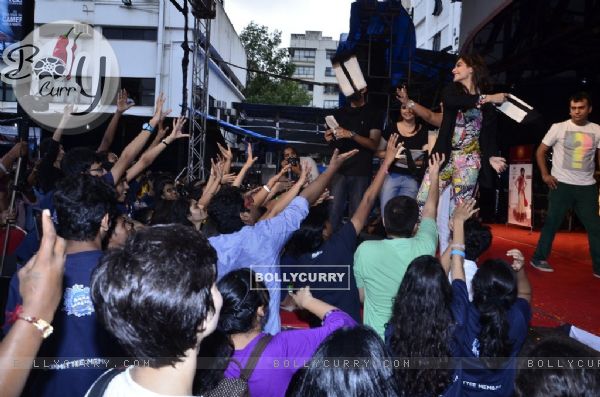 Sonam Kapoor throws some goodies to her fans at the Promotions of Khoobsurat at Mithibai College