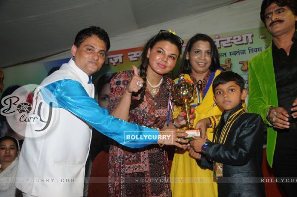 Rakhi Sawant felicitates a young achiever at the event