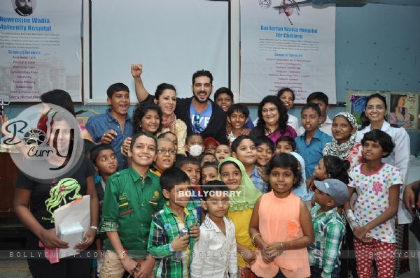 Zayed Khan poses with kids at Rouble Nagi's Art Workshop