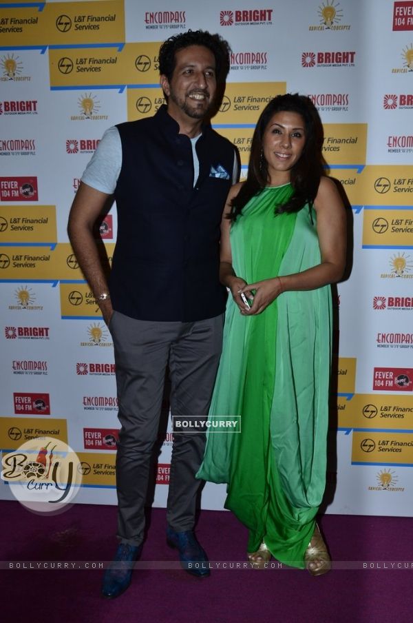 Sulaiman Merchant poses with wife at Shaan's Live Concert